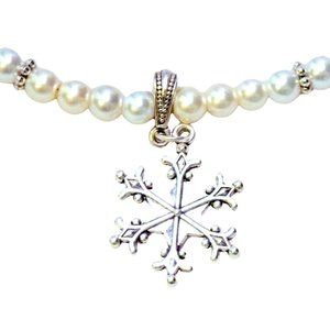 White enamel snowflake and white beaded necklace 1